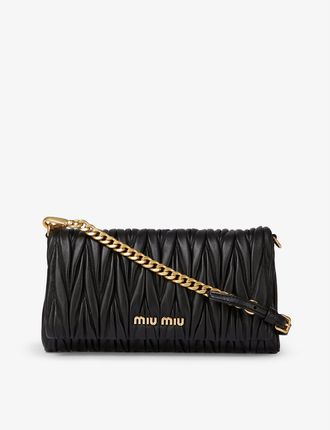 Matelassé quilted leather clutch bag