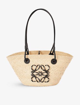 Paula’s Ibiza Anagram small Iraca palm and leather basket bag