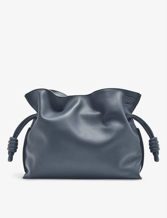 Flamenco logo-embossed leather clutch bag